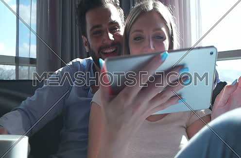 Tablet Being Used By Caucasian Couple