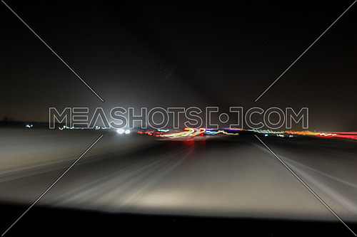 Long fot for Traffic with long exposer effect while driving at suez Road at night.