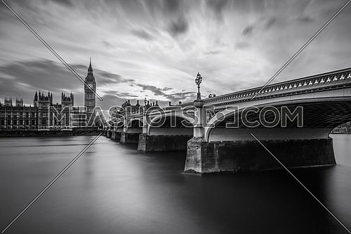 a black and white image of Westminster Bridge and BigBen, London