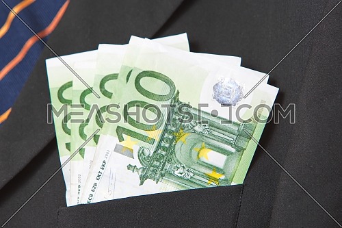 Euros in the pocket of a suit