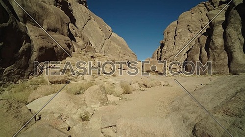 Track in shot for passage in Sinai Mountain at day.