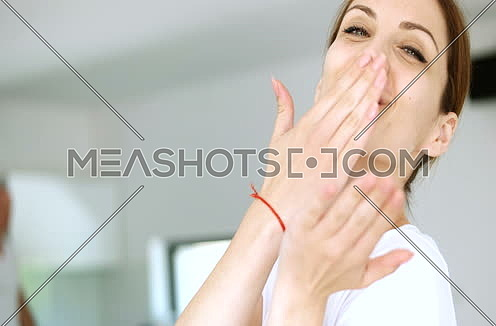 woman showing Handmade Heart at her home