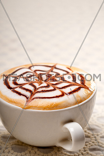 classic Italian cappuccino cup with topping decoration pattern