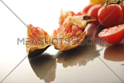 fresh fruits and vegetables isolated on white with glossy surface reflection 