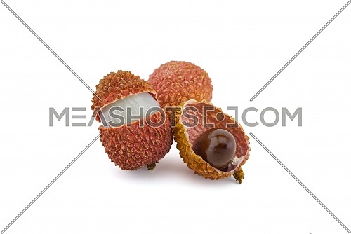 Lychee fruit whole, opened and showing seed isolated on white background