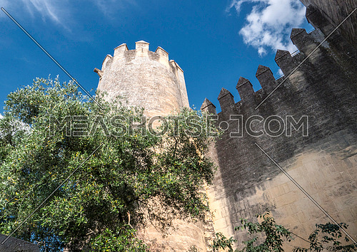 Almodovar del Rio, Cordoba, Spain - June 9, 2018: Castle of Almodovar del Rio, It is a fortitude of Moslem origin, it was a Roman fort and the current building has definitely origin Berber, take in Almodovar of the Rio, Cordoba province, Andalusia, Spain