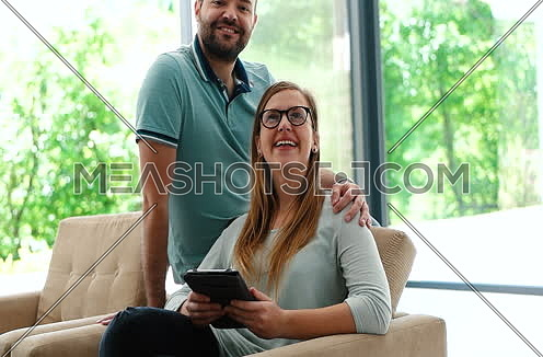 couple enjoying free time at modern home