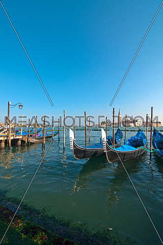 Venice Italy pittoresque view of gondolas  with Saint George island on background
