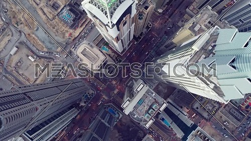 Top view of Dubai city. Aerial Drone fly over futuristic Dubai Marina district on beautiful day. Residential Modern skyscraper buildings
