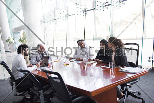multi ethnic  business people group on meeting at modern  office