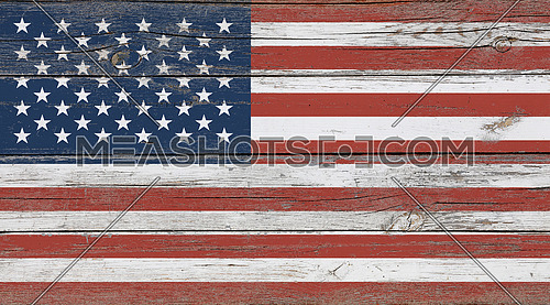 Old vintage American US flag over white wood