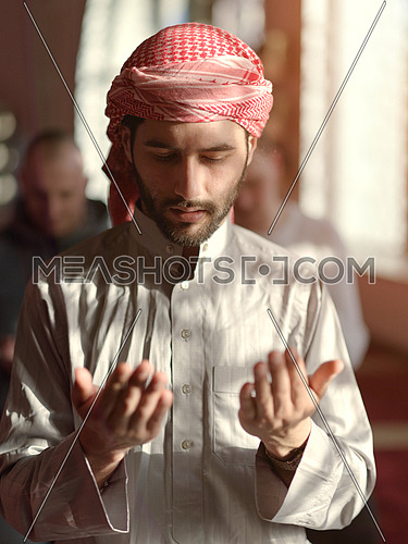group of muslim people praying namaz  in mosque