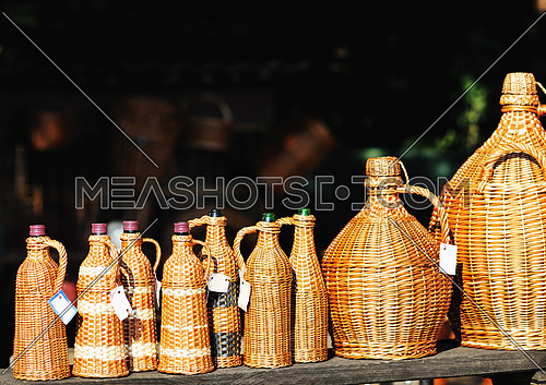 cane furniture and bottle with wood decoration outdoor in nature