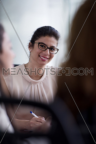 portrait of middle eastern business woman as leader  on meeting at modern office interior