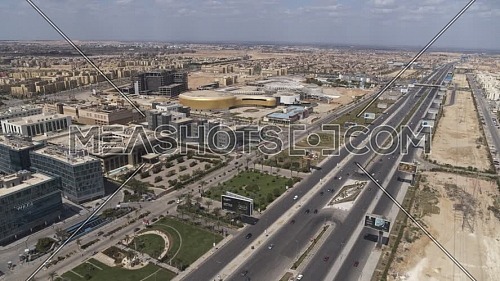 Aerial shot flying over Juhayna Bridge at 6th of October City during the corona pandemic lockdown by day 10 April
