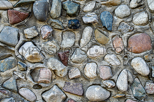 Old stone masonry wall texture background, banner with irregular pattern