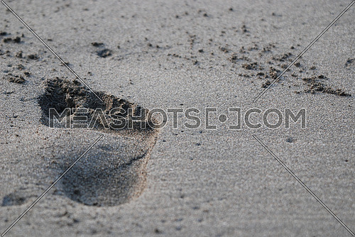 Right footprint on sand