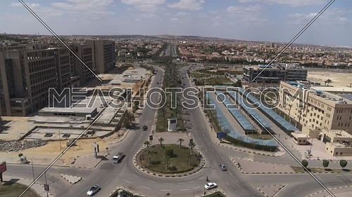 Aerial shot flying over Sheikh Zayed City empty streets during the corona pandemic lockdown by day 10 April 2020
