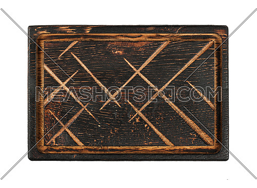 Close up of one shaped dark burnt used oak wood kitchen cutting board with knife cut traces isolated on white background