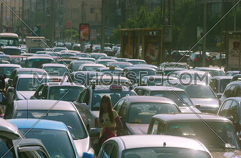 mid shot for a Traffic Jam in Cairo Downtown at noon