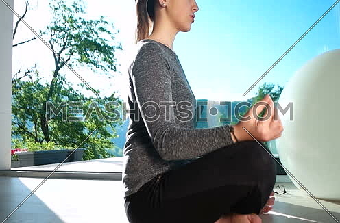  Woman Doing Yoga at terase