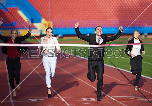 business people running together on  athletics racing track