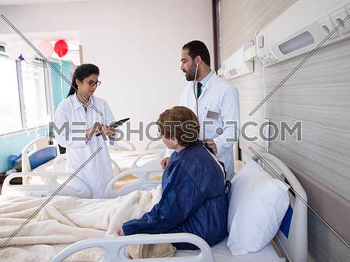 doctor with nurse  and patient at hospital