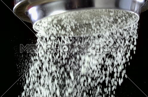 Close Up Shot for Flour Falling from a sieve