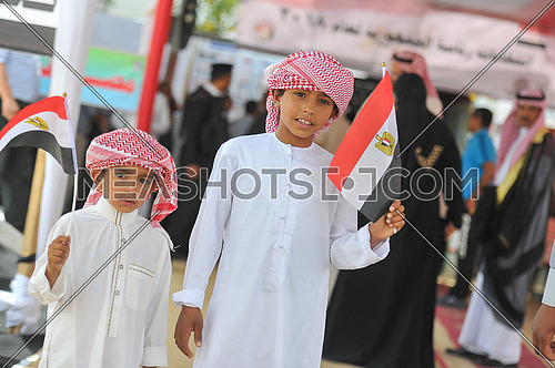 Children of Sinai Bedouins holding egyption flag waiting for their father to go out after voting in the presidential elections of 2018 in the city of peace Sharm El-Sheikh in South Sinai on the first day of the elections 26 March 2018, which lasts for 3 days