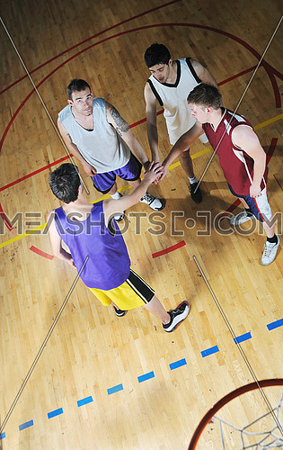 basket ball players team portrait in hi-school sport gymbasket ball players team portrait in hi-school sport gym