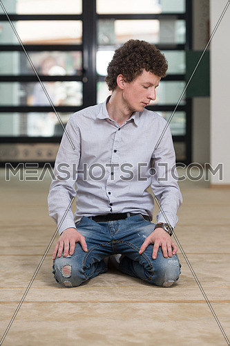 Humble White Muslim Man Is Praying In The Mosque - Afro Lock Hair Curly