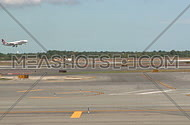Plane lands on runway (2 of 3)