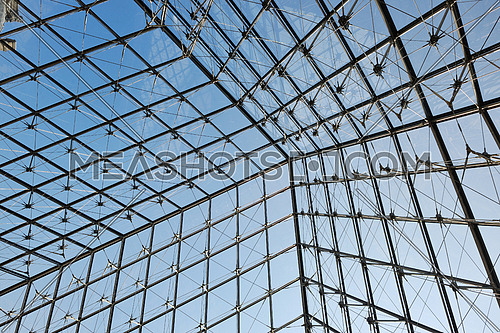 Metal roof top structure with glass construction background from Museum  du Louvre in paris france