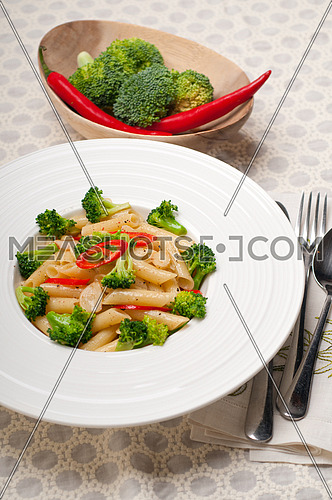 classic Italian penne pasta with broccoli and red chili pepper