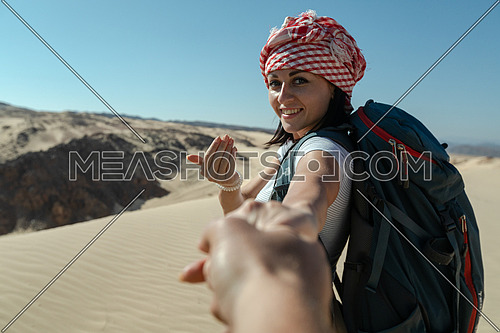 Follow me shot with female tourist from Ain Hodouda at day
