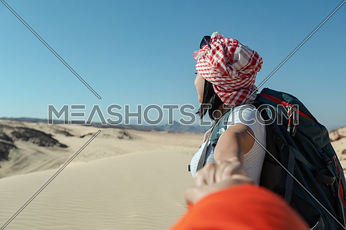 Follow me shot with female tourist from Ain Hodouda at day