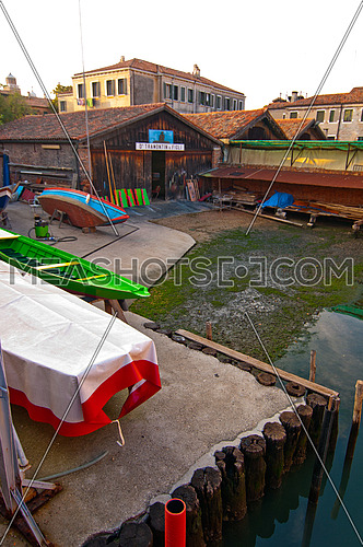 "squero " in Venice Italy is the place where gondolas and other boat are build and repaired