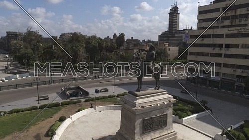 Orbit shot for Ibrahim Pasha Statue at Opera Square in Cairo Downtown empty streets during the corona pandemic lockdown by day 10 April