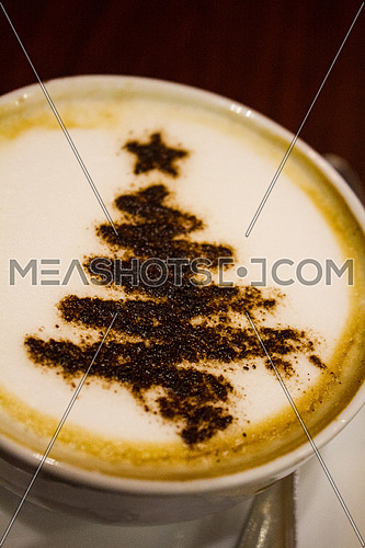 cappuccino with christmas tree powder