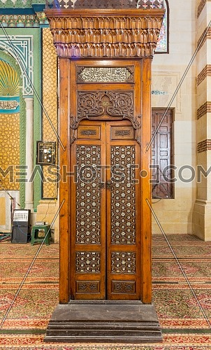 Old aged wooden door of Minbar of Imam Al Shafii Mosque with arabesque decorations tongue and groove assembled, inlaid with ivory and ebony, Old Cairo, Egypt