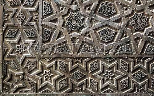 Ornaments of the bronze-plate ornate door of Sultan Qalawun mosque, an ancient historic mosque in Old Cairo, Egypt