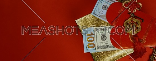 chinese new year decorations top down view with copy space and US dollar money red packet