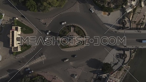 Aerial Bird-eye shot flying over Cairo Downtown empty streets showing Cairo Opera House and Saad Zaghloul Statue during the corona pandemic lockdown by day 10 April 2020
