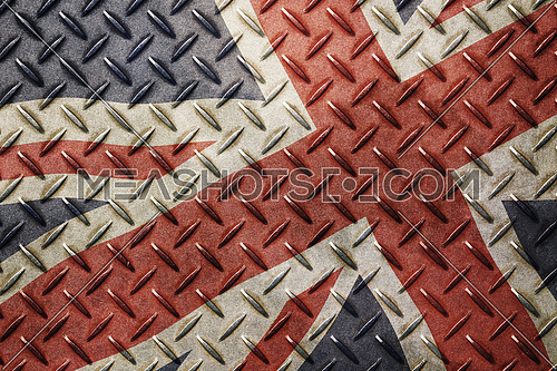 Old grunge vintage wavy UK Great Britain national flag background on anti slip embossed metal steel plate texture