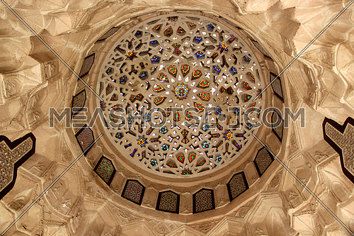a photo for the ceiling in an old house in Islamic Cairo , Egypt showing the architecture , arts and colors used at that time