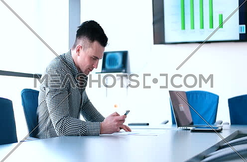 Business people using technology in modern office building