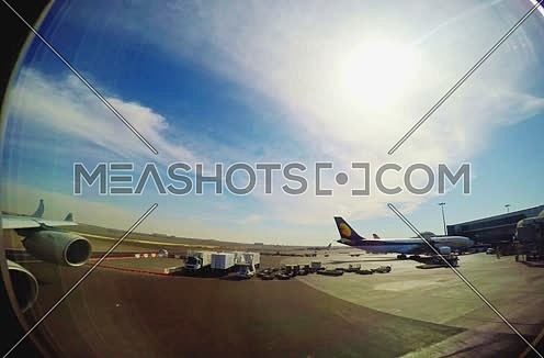 Etihad airways airplane during push back in abudhabi airport passenger view