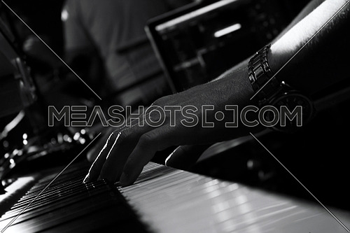 Piano Keyboards In Music Studio And A Hand Of A Musician