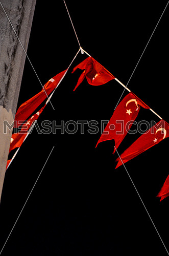 Turkey's Flag in red and white weaving in the sky