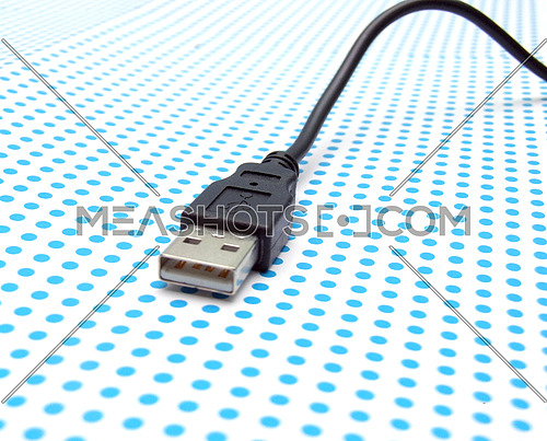 usb cable on dotted background